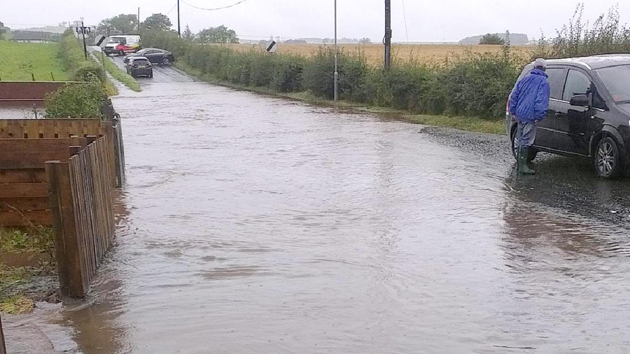 Flooding forces closure of Prestwick Airport and roads in heavy downpour