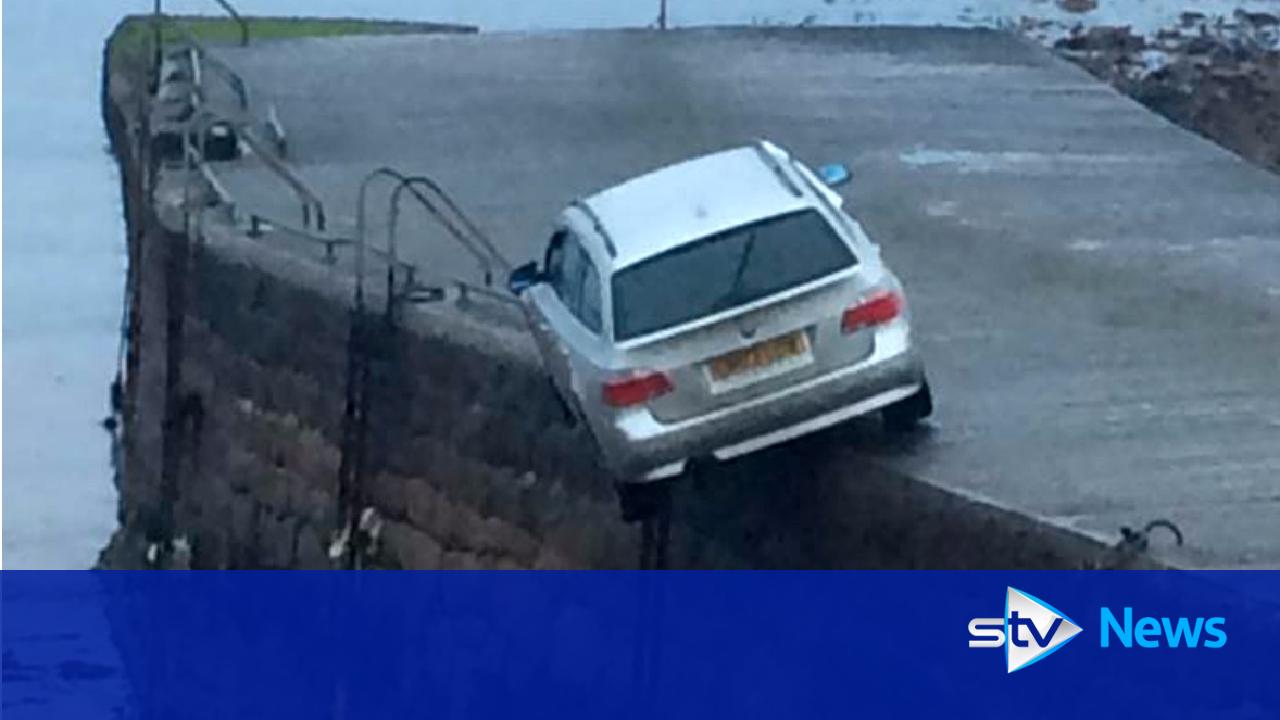 Bmw North Haven >> BMW found abandoned and dangling precariously off edge of pier Bmw North Haven >> BMW found abandoned and dangling precariously off edge of pier