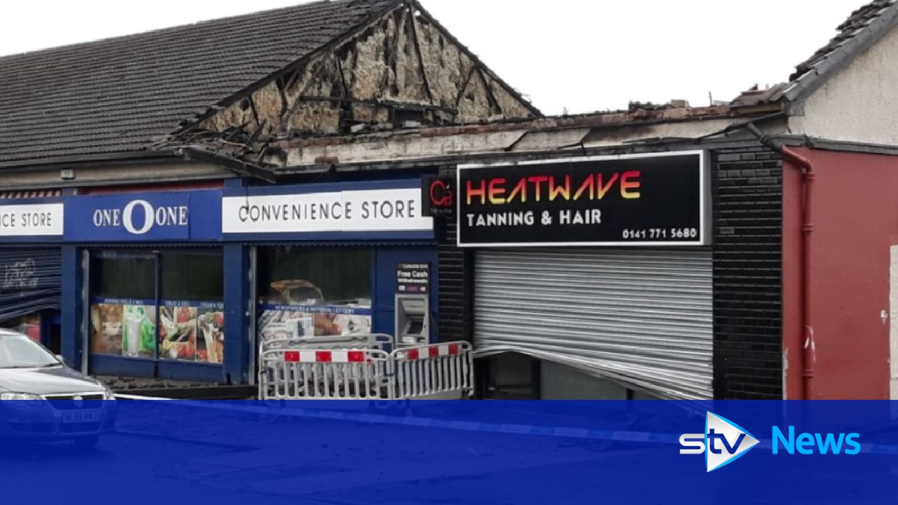 Fire rips through row of shops forcing road to close