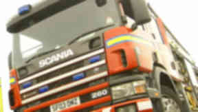 Fire: Businesses evacuated.