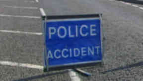 Crash: Woman fighting for life.