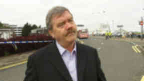 Jim Manson: The television producer, pictured moments after the attack on Glasgow Airport.