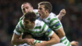 Celtic players celebrate their win over Helsingborg.