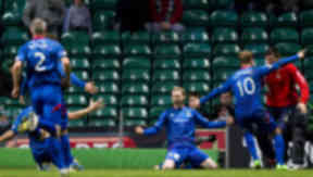 Billy McKay (centre) celebrates with his team mates after scoring to give ICT the lead