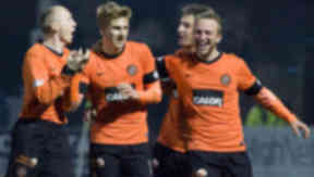 Dundee Utd ace Stuart Armstrong (centre) celebrates his goal with team mates.