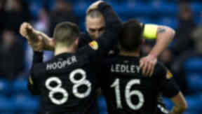 Celtic captain Scott Brown (centre) celebrates his goal with team mates Gary Hooper and Joe Ledley (right).