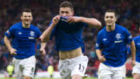 Fraser Aird (centre) wheels away in celebration after giving Rangers the lead late in stoppage time