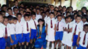 Healing power: Dr. Tanya Ekanayaka with children from one of Sri Lanka's schools in the country's southern district of Hambantota.