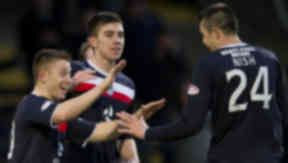 John Baird (left) celebrates with Dundee scorer Colin Nish as the home side go 4-1 ahead