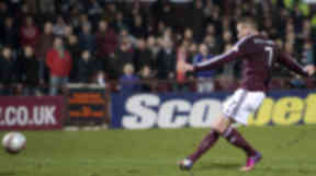 Hearts ace Ryan Stevenson opens the scoring by slotting the ball past Alan Mannus. March 5 2013