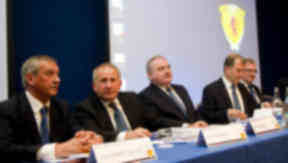 SFA board members (L-R): Campbell Ogilvie, Alan McRae, Rod Petrie, Stewart Regan, Tom Johnston and Barrie Jackson prepare to address SPL and SFL board members at the SFA annual general meeting.