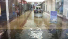 Oak Mall Shopping Centre in Greenock, Inverclyde, flooded during July 2013 downpour.