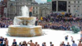 Tartan Army turn Trafalgar Square into bubble bath ahead of match against England at Wembley.