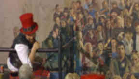 Chris Rutterford and his mural at the Tron Kirk in Edinburgh.