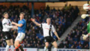 Jon Daly heads Rangers into a 1-0 lead.