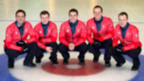 Cold comfort: David Murdoch and his all-Scottish team won silver to add to the women's team's bronze.