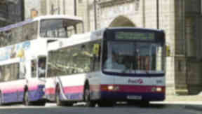 First Group blamed its US bus company for losses