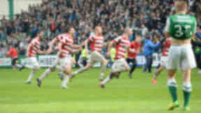 Hamilton celebrate winning promotion against Hibernian.