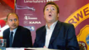 Motherwell entered administration in 2002 and have since recovered, with Bryan Jackson (left) overseeing their revival.