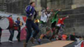 Performers can be seen on the streets around Edinburgh.