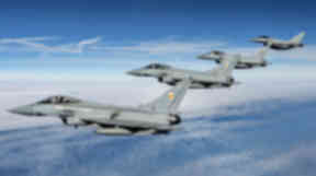 Typhoons: RAF jets escort fighters away from UK.