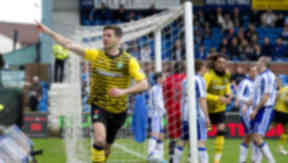 Celtic's Charlie Mulgrew celebrates heading Celtic in front