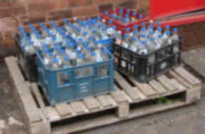 Irn-Bru bottles waiting to be cashed in.