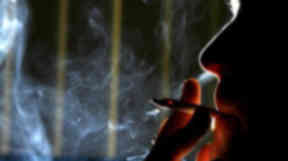 Smoking: Exposure halved in five years (file pic).