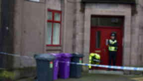 Scene: Police in Montrose after remains were found.