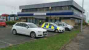 Armed robbery at Kirkcaldy Bank of Scotland. Pic from broadcast on scene. Uploaded on Nov 11 2015.