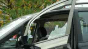 The smashed window of the vehicle from last week's incident in the same area