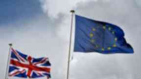 The Union flag flutters next to the EU flag