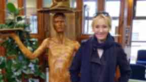 JK Rowling: Author 'apparated' to library.