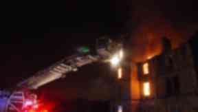 Battle: Fire crews used an aerial rescue pump to fight the blaze.