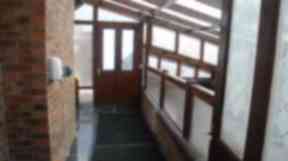 Entrance: Image from footage of room containing fish tank where twins drowned.