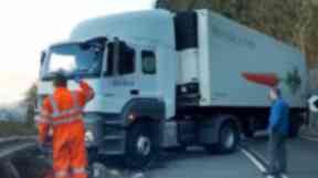 A82: Lorry crashes into barrier and blocks road.