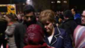 Vigil: First Minister Nicola Sturgeon pays her respects.