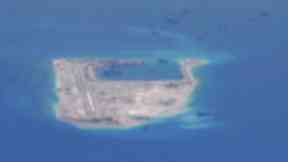 Chinese dredging vessels are purportedly seen in the waters around Fiery Cross Reef in the disputed Spratly Islands in the South China Sea