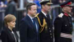 Service: Nicola Sturgeon and David Cameron at the Kirkwall ceremony.