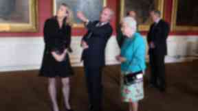 The Queen pictured the artist Nicky Philipps and the Duke of Buccleuch.