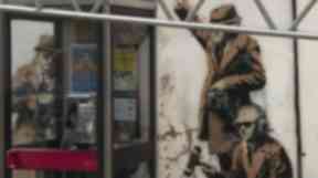 The mural, located about 3 miles from government listening post GCHQ, has been a source of controversy ever since it appeared.
