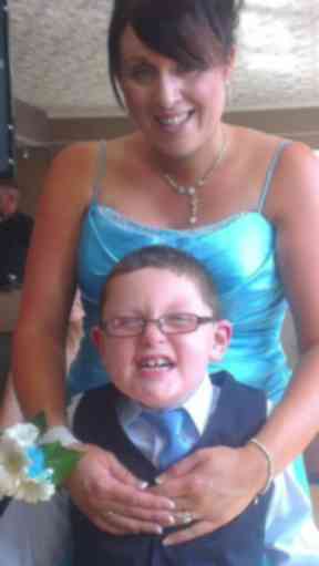 Calum, 10, with his mother Stacey McPherson.