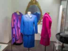 Three outfits and a hat worn by Baroness Thatcher are now on display in the V&A.