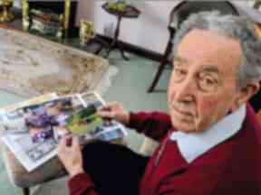 Bert with photos of his old car.