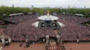 Crowds watch the Royal family from the Mall during the Diamond Jubilee celebrations in 2012