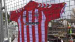 Ryan McBride's shirt was hung near Derry City's football ground in Brandywell in tribute.