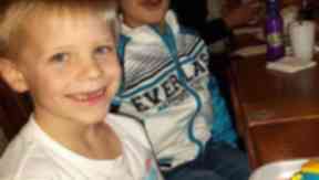 Van: Kieran was wearing a blue top.