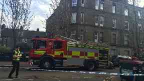 Park Avenue: Road closed after fire rips through block of flats.
