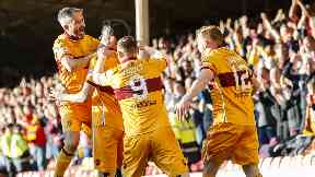 Motherwell celebrate securing their Premiership status.