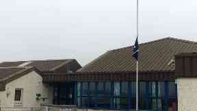 Island: Flag flying at half mast in Barra.
